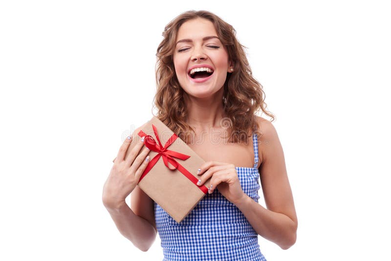 Riant teenager with a present box