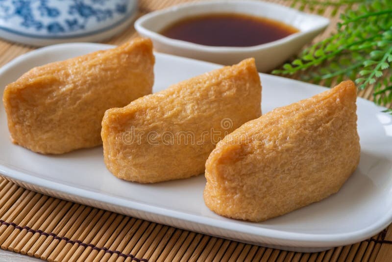 Rice Ball Wrapped in Deep Fried Tofu Pouches Inari Sushi, Japanese Food