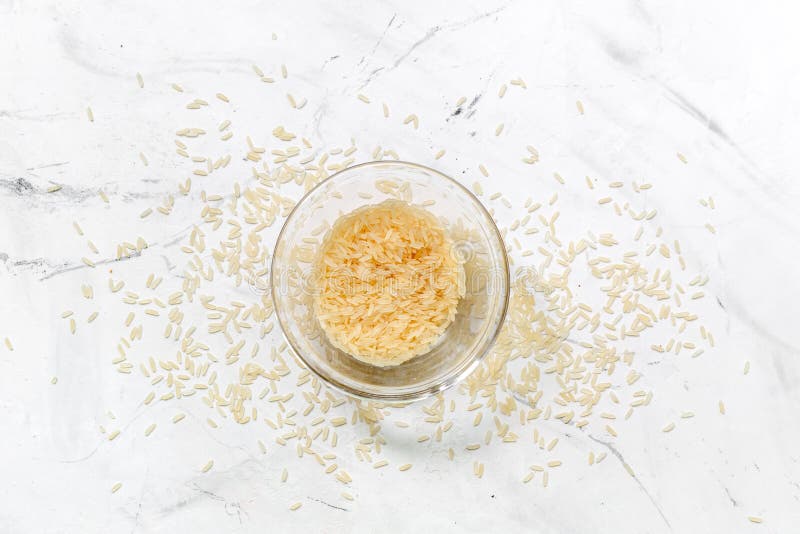 Download Rice In Bowl For Paella On White Desk Background Top View Mock Up Stock Image - Image of product ...