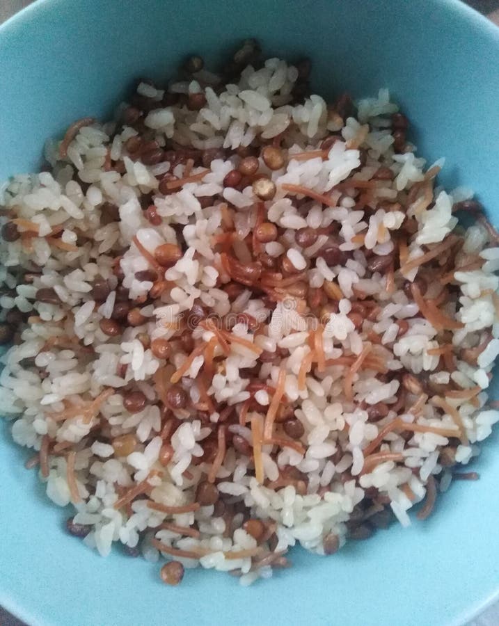 Rice with Brown Lentils , on Blue Plate Stock Photo Image of