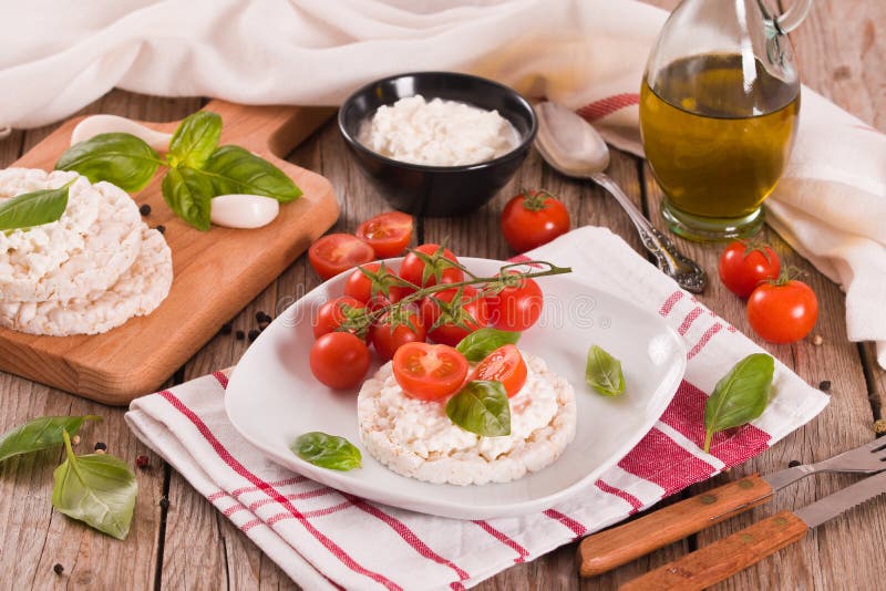 Rice Cakes with Milk Flakes and Tomato. Stock Image Image of cakes