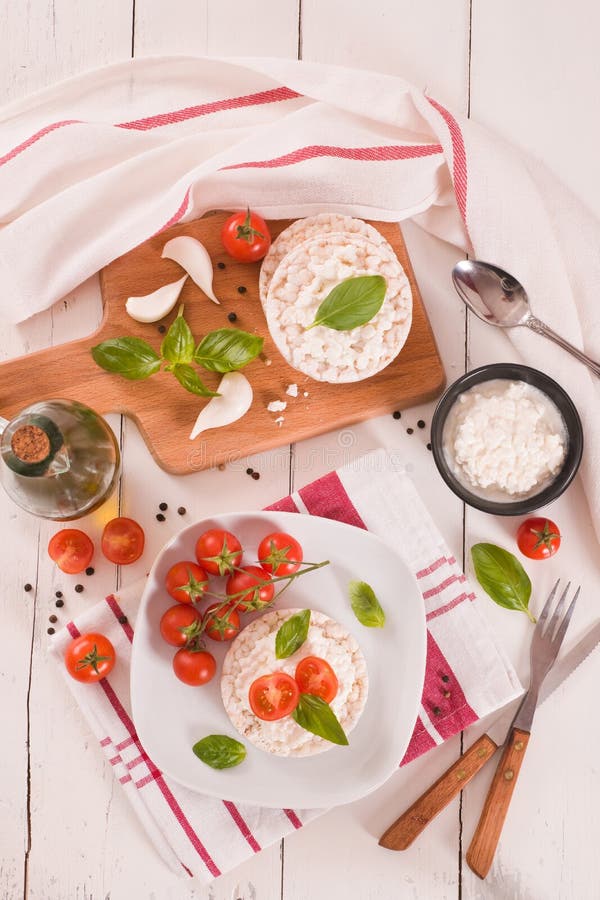 Rice Cakes with Milk Flakes and Tomato. Stock Photo Image of dietary