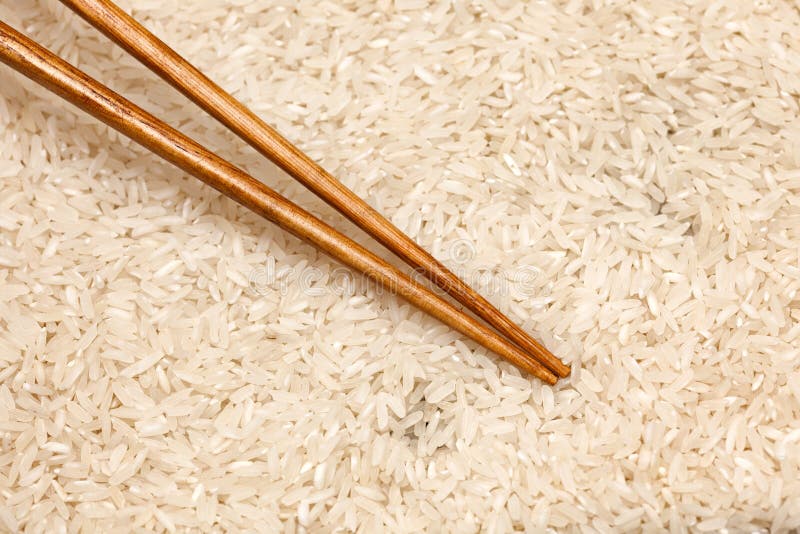 Rice and chopsticks stock photo. Image of vegeterian 48616318