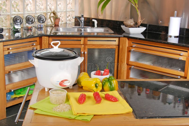 Rice cooker in the kitchen stock photo