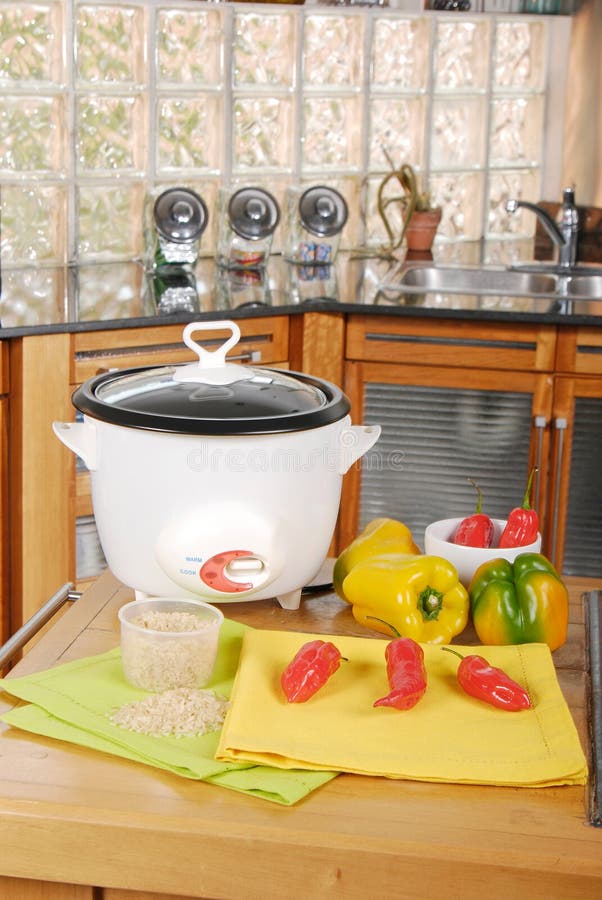 Rice cooker in the kitchen stock photo