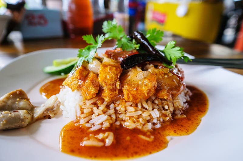 Rice Crispy Pork with Dry Chili and Coriander in White Plate Stock