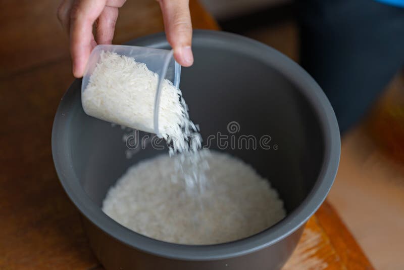 Rice Cup Measuring before Cooking Rice Stock Image - Image of health
