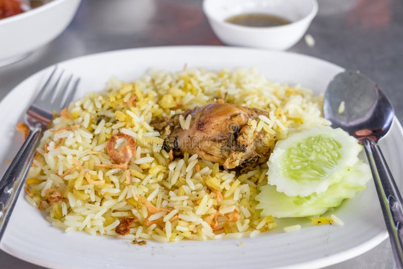 Rice Curried Chicken Biryani with Sauce Sweet and Sour Stock Image