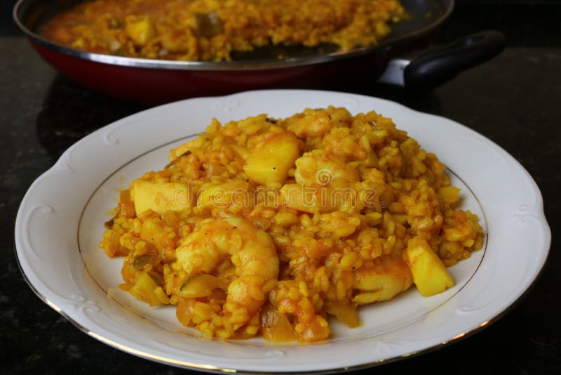 Rice with cuttlefish and prawns stock image Rice with cuttlefish and prawns stock image