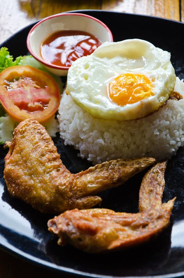 Rice with Fried Chicken Wings and Fried Egg Stock Photo Image of