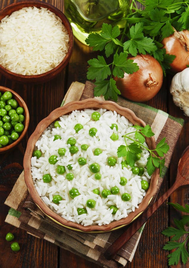 Rice with green peas stock image. Image of plate, nutrition 170076439