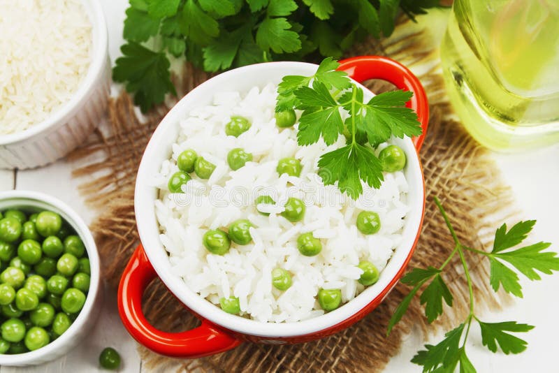 Rice with green peas stock photo. Image of grain, green 164727430