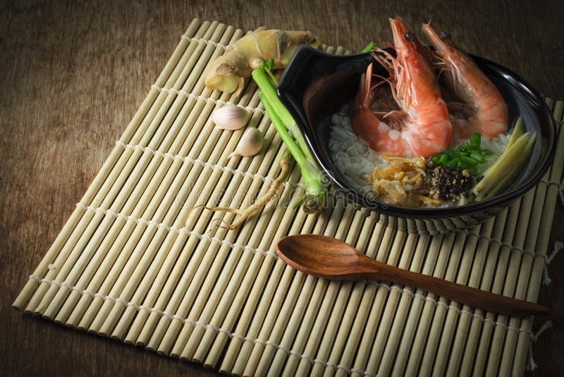 Rice Gruel Mixed with Prawn and Ginger, Scallion Slice and Deep Fried