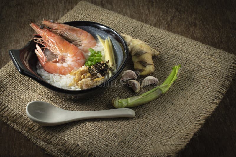 Rice Gruel Mixed with Prawn and Ginger, Scallion Slice and Deep Fried