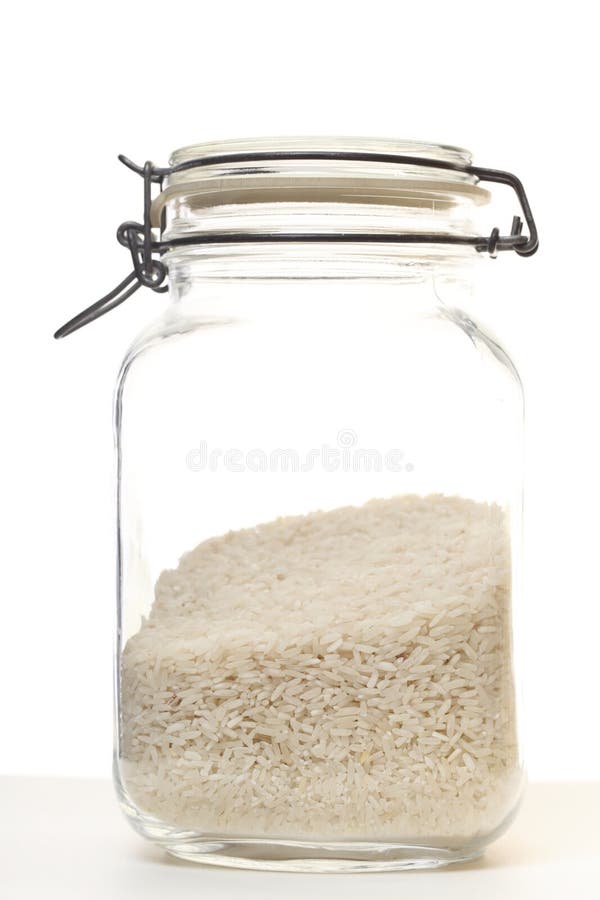 Rice in jar on white background
