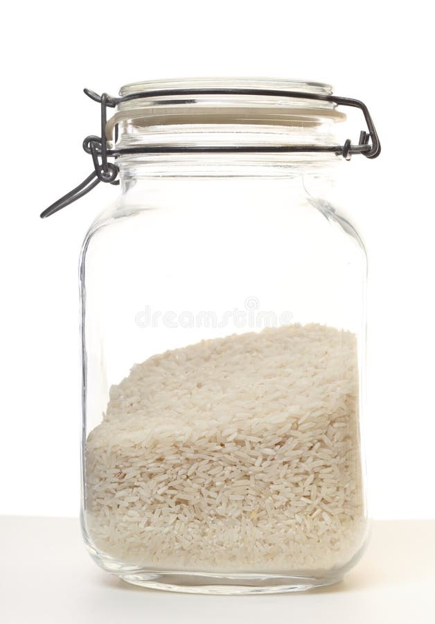 Rice in jar on white background