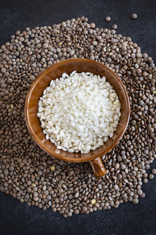 Rice and Lentils on a Dark Background. Complete Protein Sources Stock