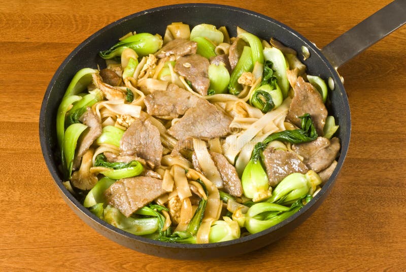 Rice Noodles and Beef Stir Fry Stock Image - Image of sliced, colored