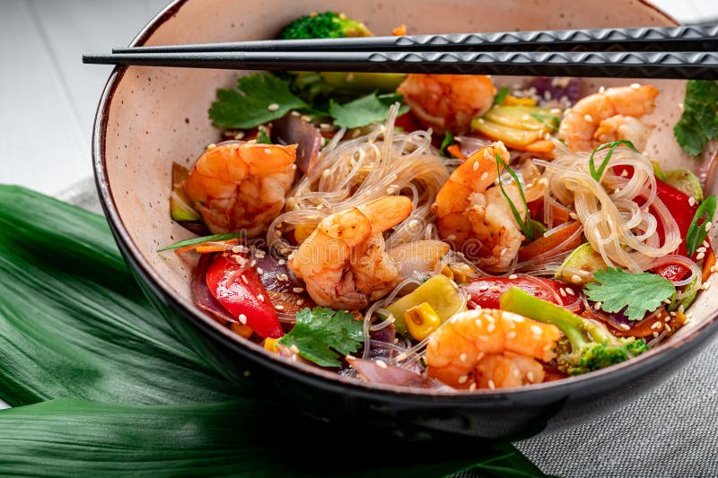 Rice Noodles with Shrimp and Vegetables. Asian Cuisine Stock Photo