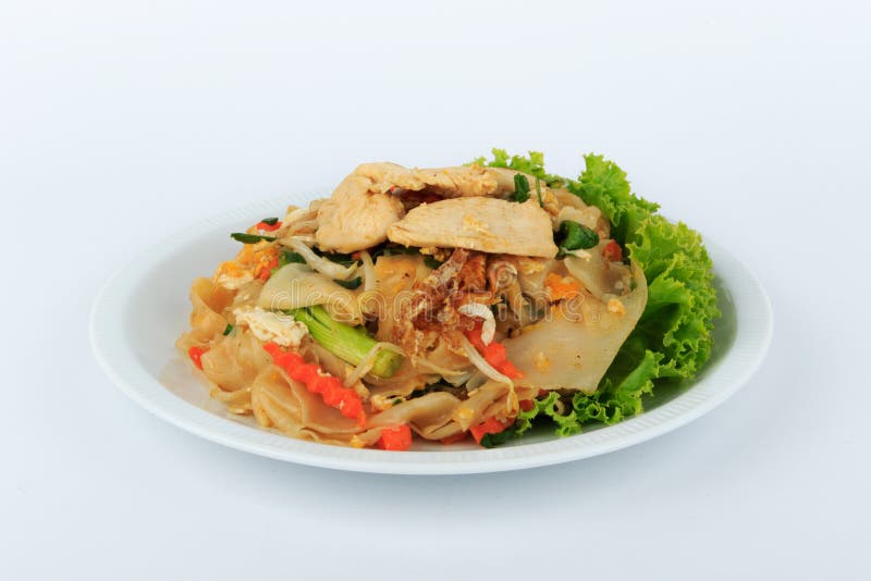 Rice Noodles Stir-fried with Chicken. Thai Street Food. Stock Photo