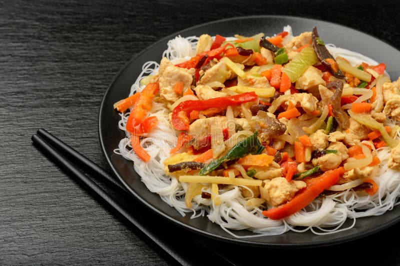 Rice Noodles with Vegetables, Mushrooms, Chicken and Soy Sauce. Stock