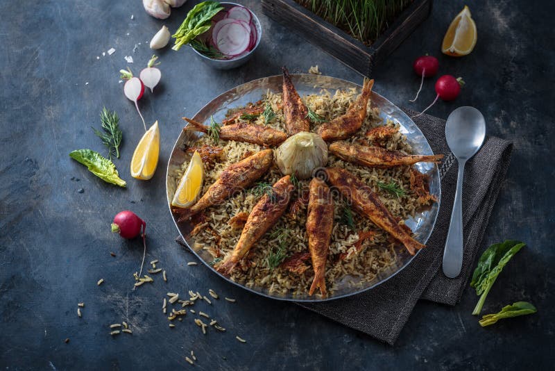 Rice Pilaf with Different Herbs and Fish. Persian Cuisine Stock Image