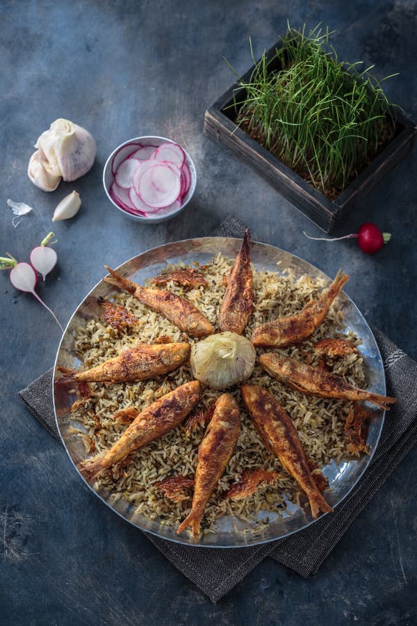 Rice Pilaf with Different Herbs and Fish. Persian Cuisine Stock Image