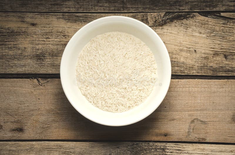 Rice in a Plate. Ready for Cooking. Healthy Food. Stock Photo Image