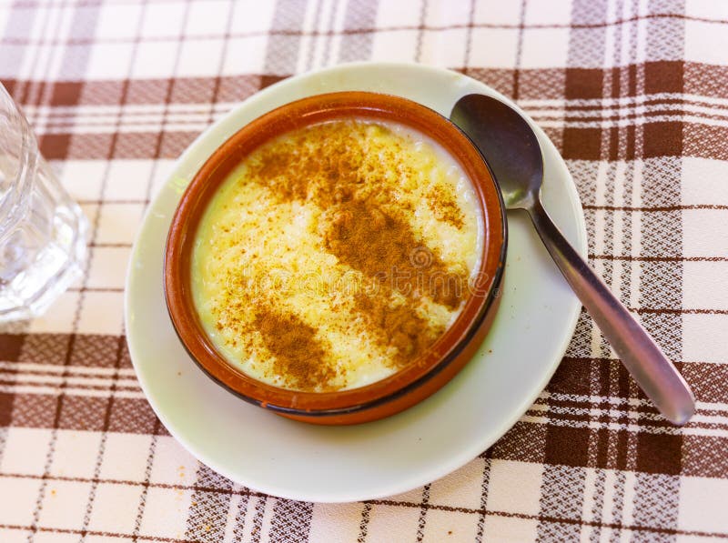Rice Pudding. Sweet Dish Made by Cooking Rice in Milk and Sugar, Some