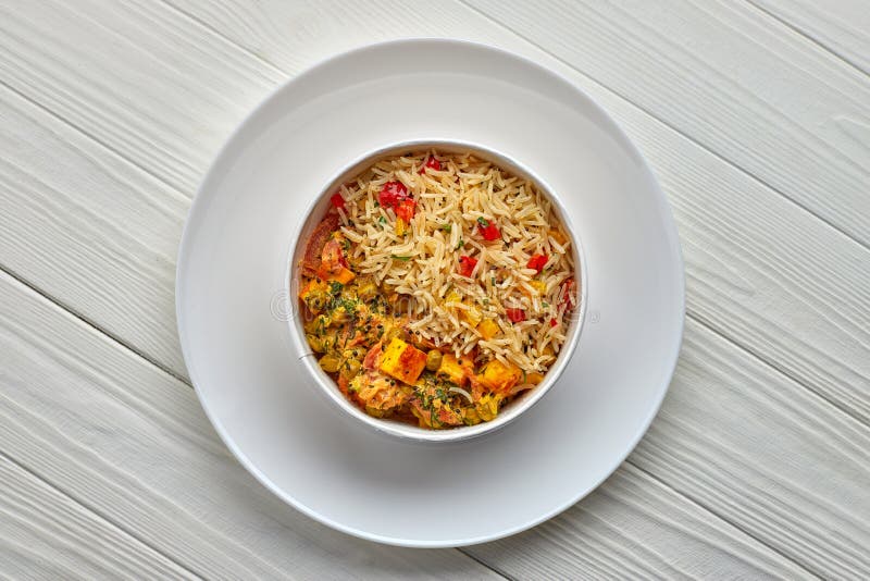 Rice with Vegetables and Cheese on a White Plate Stock Photo Image of tasty, healthy 259864214