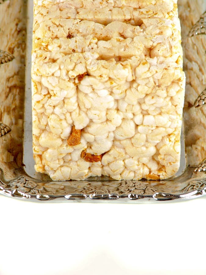 Rice, Wheat Bread in the Basket on Brown Background Stock Photo Image