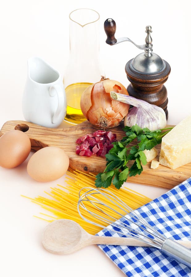 Ingredients and utensils for spaghetti alla carbonara. Ingredients and utensils for spaghetti alla carbonara