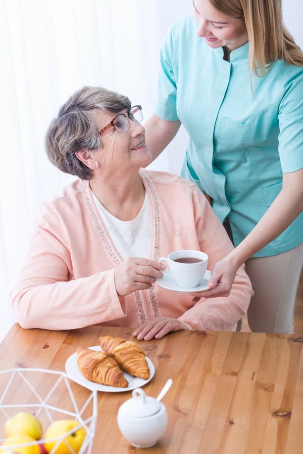 Rich elderly woman having care