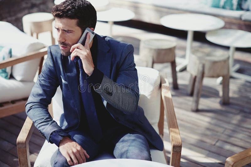 Rich man has telephone call