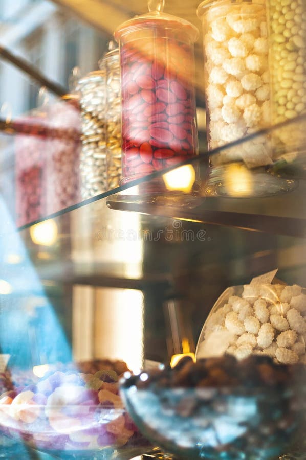 Rich variety of chocolates and candies in display window of ita