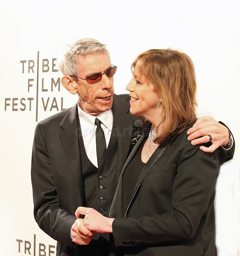 Stand-up comedian, actor, and author, Richard Belzer arrives on the red carpet with Tribeca Film Festival co-founder Jane Rosenthal, for the world premiere of "Mistaken for Strangers," marking the formal kickoff of the 12 Annual Tribeca Film Festival at the Tribeca Performing Arts Center of the Borough of Manhattan Community College on April 17, 2013. Belzer played the same role, "Detective John Munch," in 22 straight years: 7 as part of the Baltimore Police Department, and then 15 years as part of the New York Police Department. He died on February 19, 2023, in the south of France, from complications from circulatory and respiratory maladies, at the age of 78. Stand-up comedian, actor, and author, Richard Belzer arrives on the red carpet with Tribeca Film Festival co-founder Jane Rosenthal, for the world premiere of "Mistaken for Strangers," marking the formal kickoff of the 12 Annual Tribeca Film Festival at the Tribeca Performing Arts Center of the Borough of Manhattan Community College on April 17, 2013. Belzer played the same role, "Detective John Munch," in 22 straight years: 7 as part of the Baltimore Police Department, and then 15 years as part of the New York Police Department. He died on February 19, 2023, in the south of France, from complications from circulatory and respiratory maladies, at the age of 78.