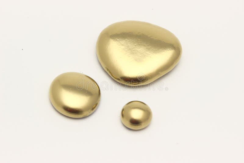 Gold Pebble contemplation of richness