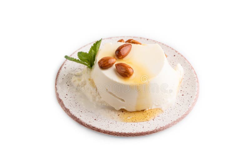 Ricotta Cheese with Honey and Almonds Isolated on White. Side View