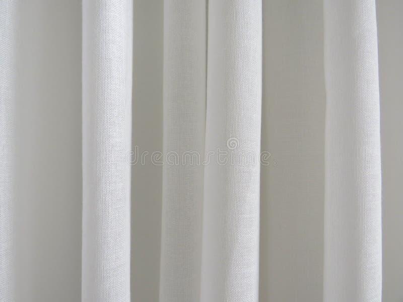 White curtain sheet texture. White curtain background. Ivory chiffon curtains. White curtain sheet texture. White curtain background. Ivory chiffon curtains.