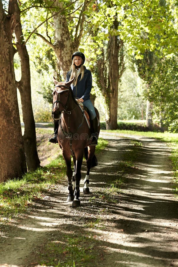 Rider and horse in the woods