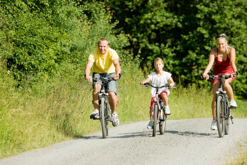 Riding the Bicycles Together Stock Photo Image of rural, family 6417738