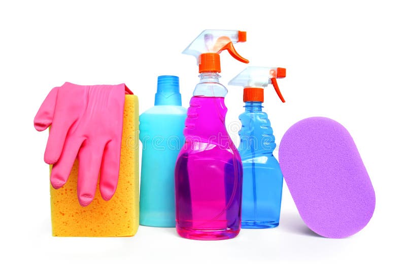 Cleaning supplies on white background including several spray bottles of chemicals, rubber gloves and sponges. Cleaning supplies on white background including several spray bottles of chemicals, rubber gloves and sponges.