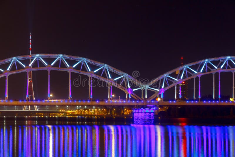 Riga. Railway bridge at night stock photo Riga. Railway bridge at night stock photo