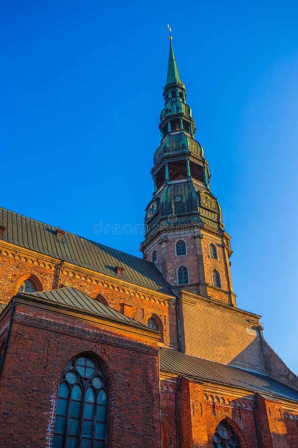 Riga St. Peter&#x27;s Church - the tallest peak in Riga, is one the oldest and most valuable monuments of medieval royalty free stock photography