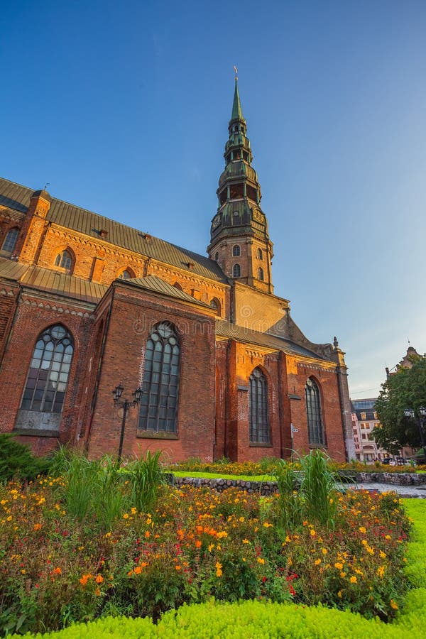Riga St. Peter&#x27;s Church - the tallest peak in Riga, is one the oldest and most valuable monuments of medieval royalty free stock photos