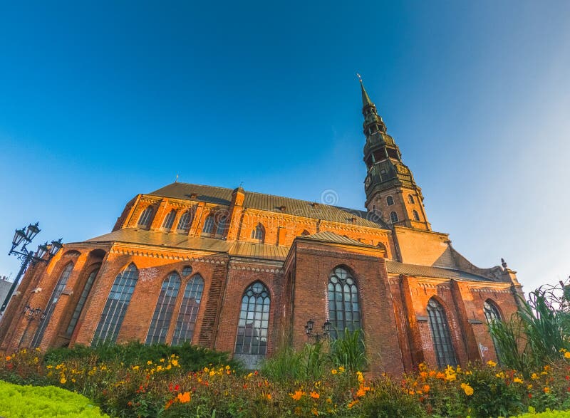 Riga St. Peter&#x27;s Church - the tallest peak in Riga, is one the oldest and most valuable monuments of medieval royalty free stock photos