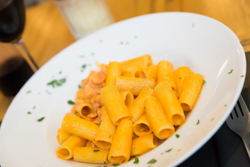 Rigatoni Pasta with Bacon, Tomato and Cream Stock Photo - Image of