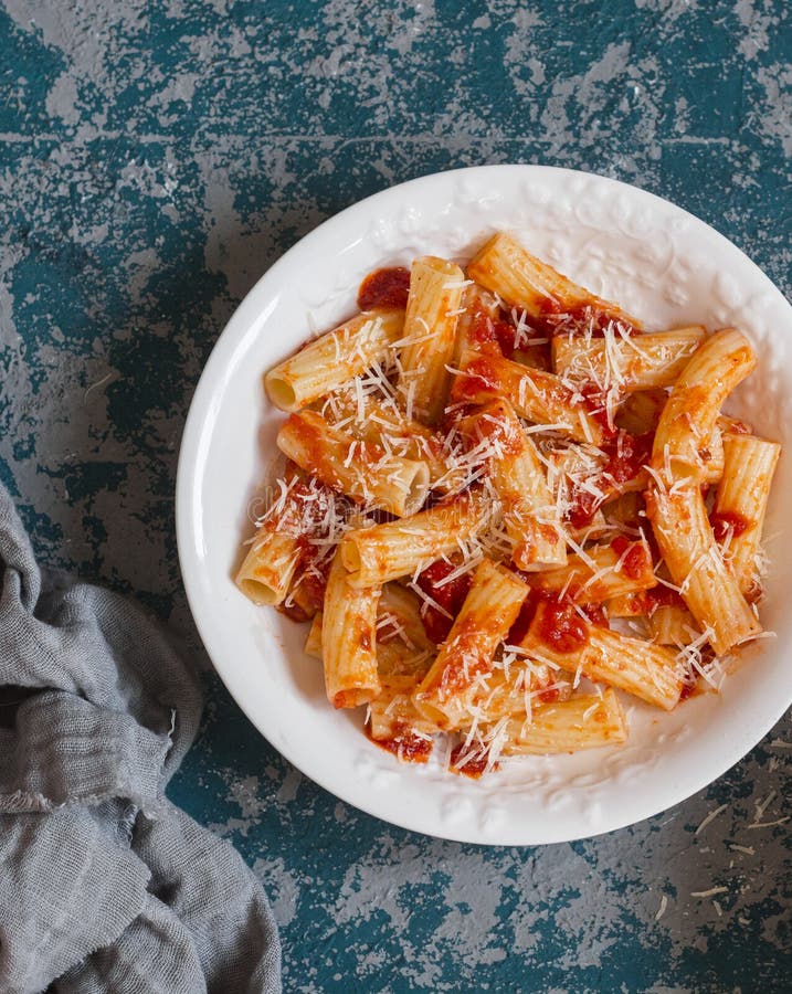 Rigatoni with tomato sauce. Delicious mediterranean lunch royalty free stock images