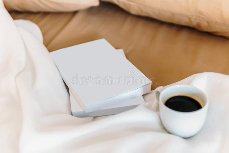 Relaxing With Coffee Cup And Good Books In Bed On Weekend. Relaxing With Coffee Cup And Good Books In Bed On Weekend