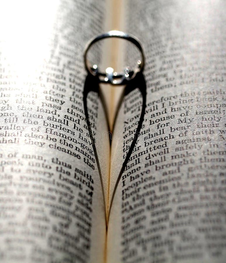 Ring on a bible. stock photo. Image of circle, words - 93805556